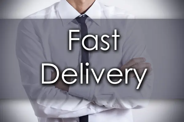Fast Delivery - молодий бізнесмен з текстом - бізнес-концепція — стокове фото
