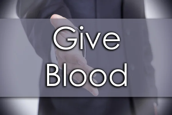 Give Blood - бизнес-концепция с текстом — стоковое фото