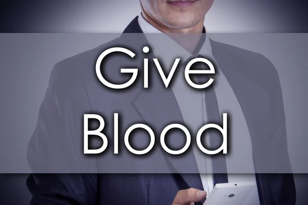 Give Blood - Jovem empresário com texto - conceito de negócio — Fotografia de Stock