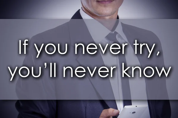 If you never try, you'll never know - Young businessman with t — Stock Photo, Image
