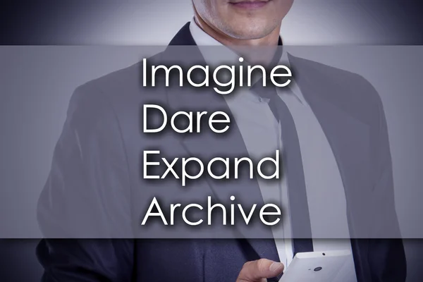 Imagine Dare Expand Archive IDEA - Young businessman with text -