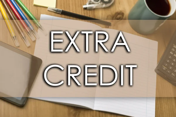 Extra kredyt - koncepcja biznesowa z tekstem — Zdjęcie stockowe