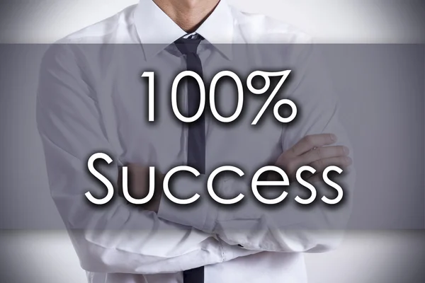 100% успех - Молодой бизнесмен с текстовой - бизнес-концепцией — стоковое фото