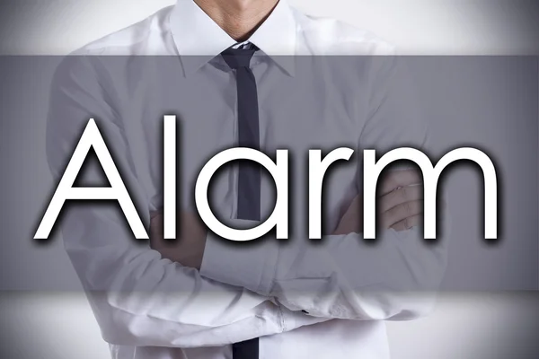 Alarma - Joven empresario con texto - concepto de negocio —  Fotos de Stock