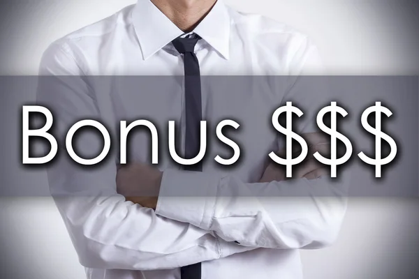 Бонус $$$ - молодий бізнесмен з текстом - бізнес-концепція — стокове фото