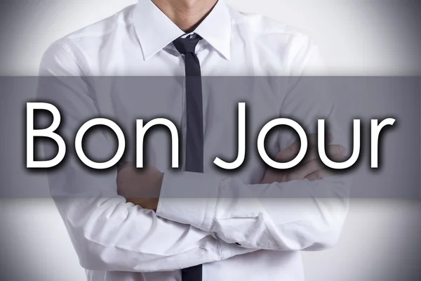 Bon Jour - Jovem empresário com texto - conceito de negócio — Fotografia de Stock