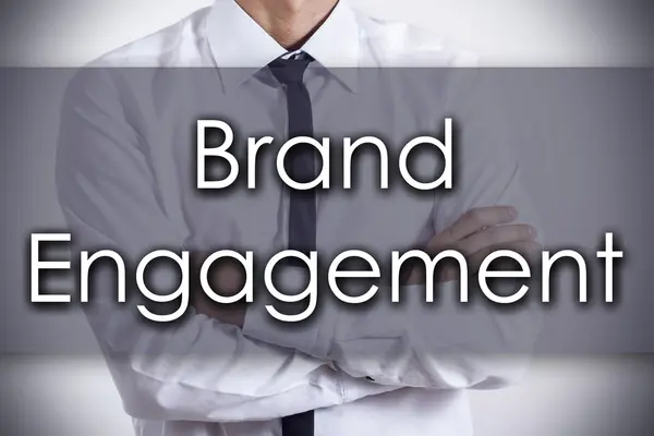 Brand Engagement - Young businessman with text - business concep — Stock Photo, Image