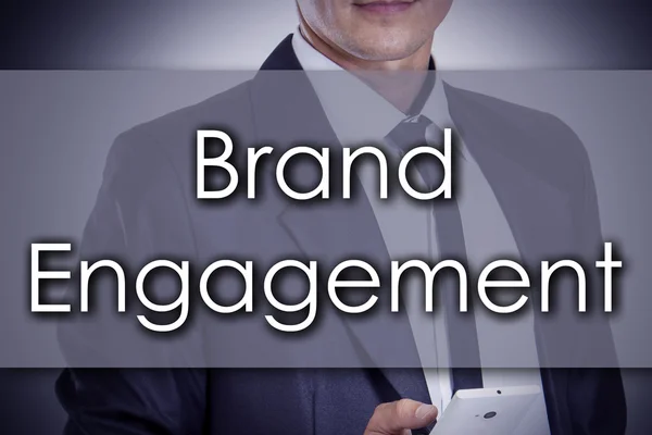 Brand Engagement - Young businessman with text - business concep — Stock Photo, Image