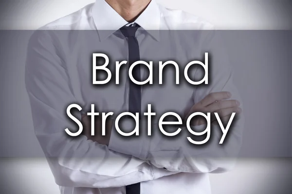 Brand Strategy - Young businessman with text - business concept — Stock Photo, Image