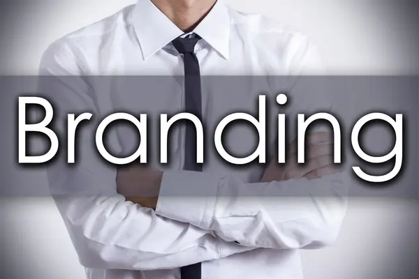 Branding - Young businessman with text - business concept — Stock Photo, Image