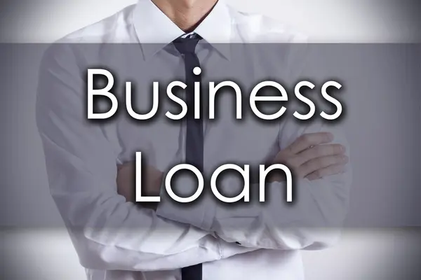 Koncepcja biznesowa pożyczki - młody biznesmen z tekstem - firmy — Zdjęcie stockowe