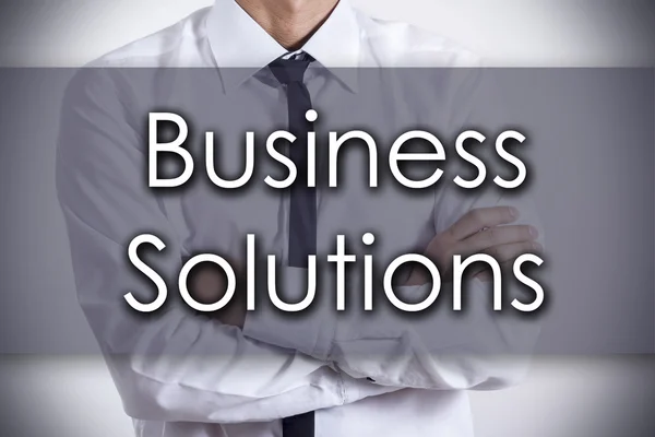 Business Solutions - Young businessman with text - business conc — Stock Photo, Image