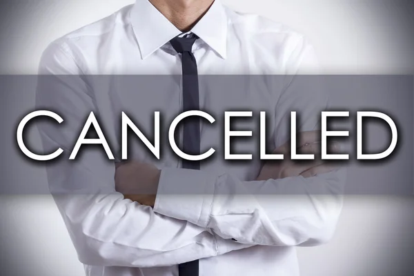 CANCELLED - Young businessman with text - business concept — Stock Photo, Image