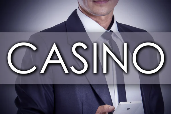 Casino - ung affärsman med text - affärsidé — Stockfoto