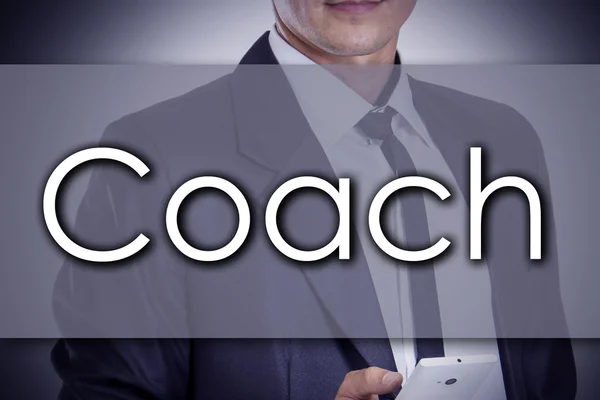 Coach - Young businessman with text - business concept — Stock Photo, Image