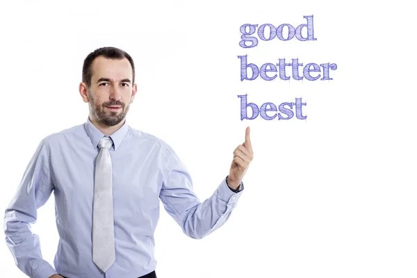 Good better best  - Young businessman pointing up — Stock Photo, Image