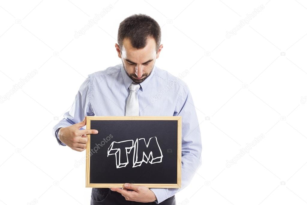 Trade Mark - Young businessman with blackboard