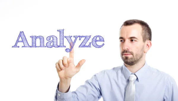 Analyseren - jonge zakenman met blauwe tekst — Stockfoto