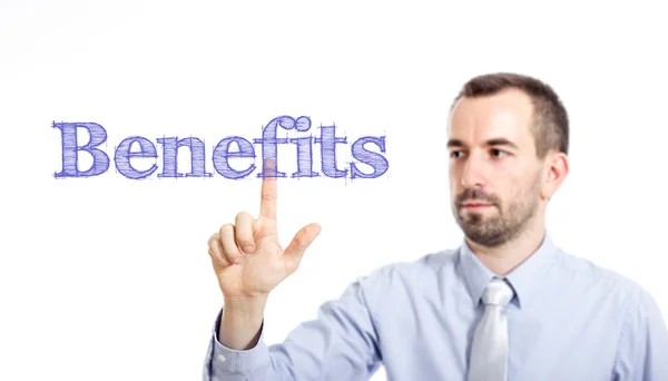 Benefits - Young businessman with blue text — Stock Photo, Image