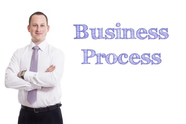 Bedrijfsproces - jonge zakenman met blauwe tekst — Stockfoto