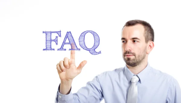 FAQ - mladý podnikatel s modrým textem — Stock fotografie