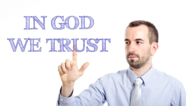 En Dios confiamos - Joven hombre de negocios con texto azul —  Fotos de Stock