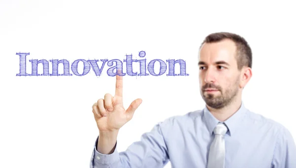 Inovação - Jovem empresário com texto azul — Fotografia de Stock