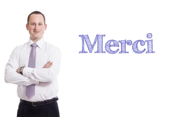 Merci - junger Geschäftsmann mit blauem Text — Stockfoto