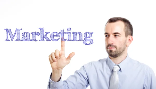 Marketing - Joven hombre de negocios con texto azul — Foto de Stock