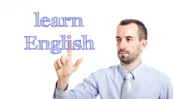 Learn English - jonge zakenman met blauwe tekst — Stockfoto