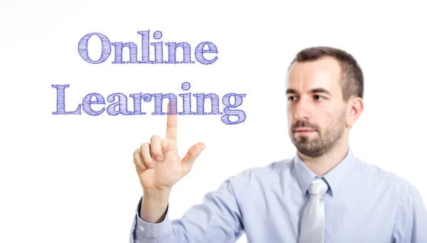 Aprendizaje en línea - Joven hombre de negocios con texto azul — Foto de Stock