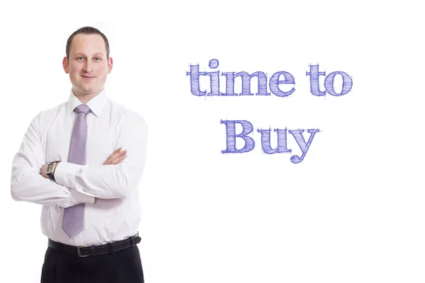 Time to buy - Young businessman with blue text — Stock Photo, Image