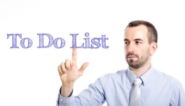 To Do List - Молодой бизнесмен с синим текстом — стоковое фото