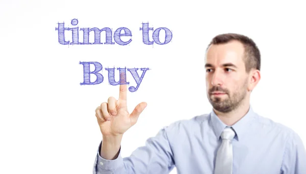 Time to buy - Young businessman with blue text — Stock Photo, Image