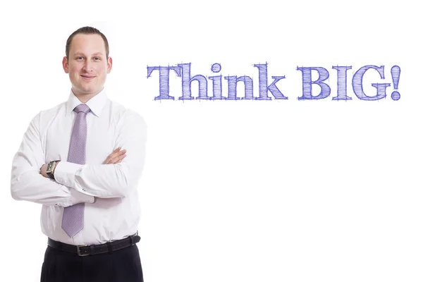 Think big - ung affärsman med blå text — Stockfoto