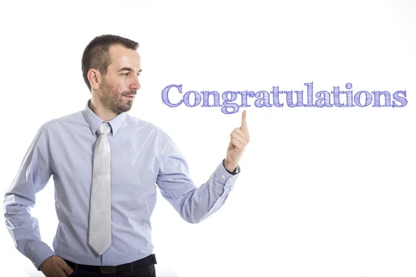 Felicitaciones - Joven hombre de negocios con texto azul —  Fotos de Stock