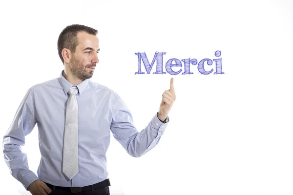 Merci - Joven hombre de negocios con texto azul — Foto de Stock