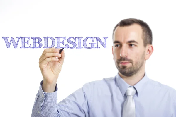 Webdesign - Young businessman with blue text — Stock Photo, Image