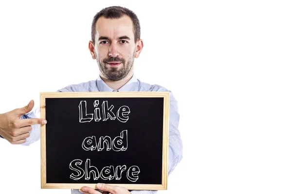 Like and Share - Молодой бизнесмен с доской — стоковое фото