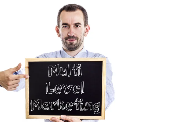 Multi Level Marketing Mlm - jonge zakenman met blackboard - geïsoleerd op wit — Stockfoto