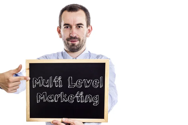 Multi Level Marketing Mlm - jonge zakenman met blackboard - geïsoleerd op wit — Stockfoto