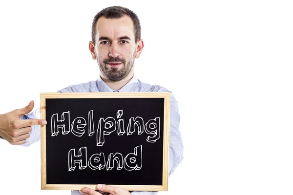 Hjälpande Hand - ung affärsman med blackboard — Stockfoto