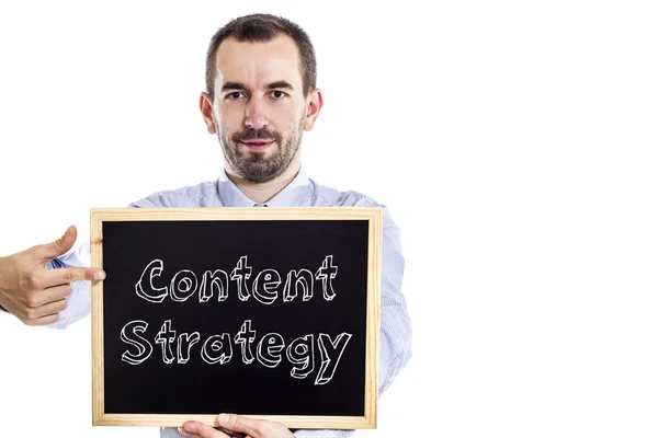 Estratégia de conteúdo - Jovem empresário com quadro negro — Fotografia de Stock