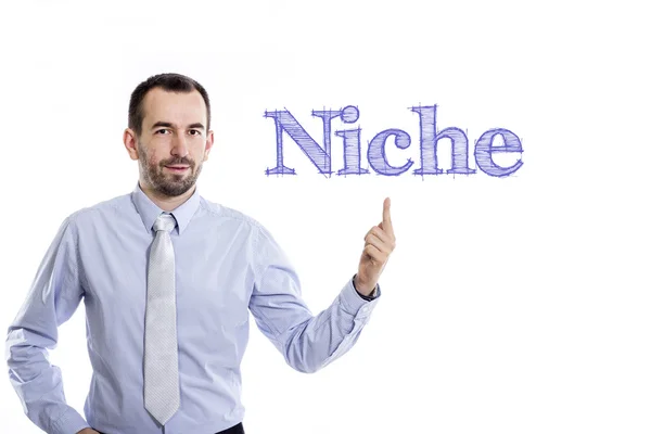 Nicho - Jovem empresário com barba pequena apontando para cima em camisa azul — Fotografia de Stock