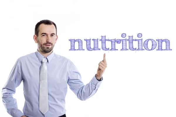 Nutrition- Jeune homme d'affaires avec une petite barbe pointant vers le haut en chemise bleue — Photo