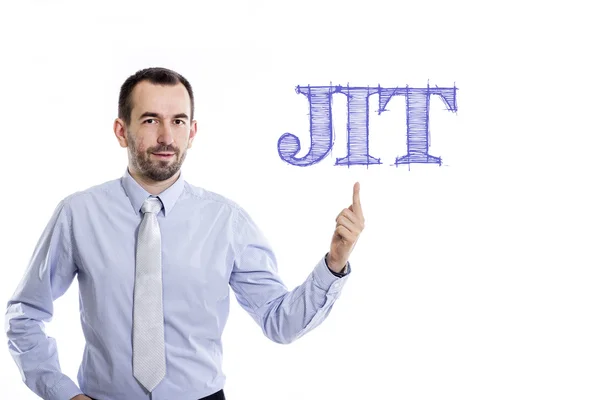 JIT - Young businessman with blue text — Stock Photo, Image