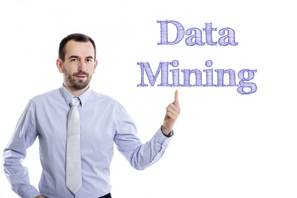 Data Mining - молодий бізнесмен з синім текстом — стокове фото