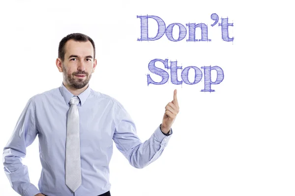 Don't Stop - mladý podnikatel s modrým textem — Stock fotografie