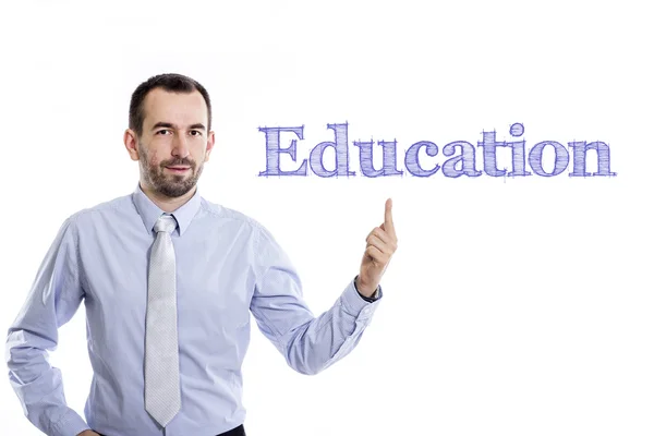 Educação - Jovem empresário com texto azul — Fotografia de Stock