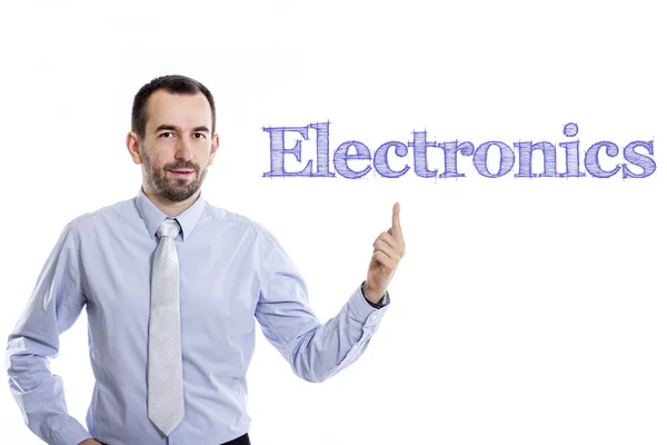 Electronics - Young businessman with blue text — Stock Photo, Image